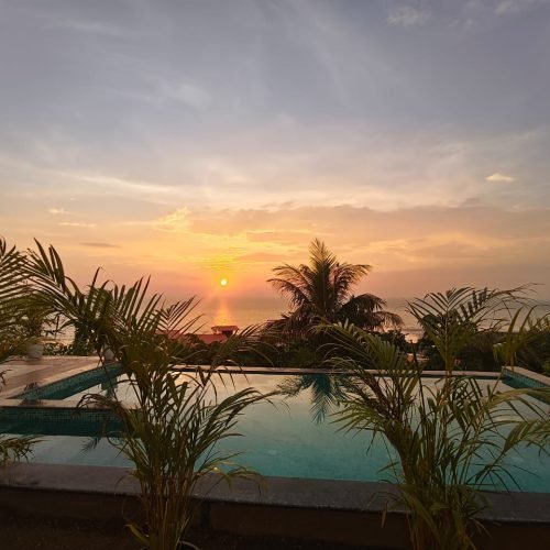 Evening view of the infinity pool at Villa Infinity By The Sea near Karde Beach, Dapoli.